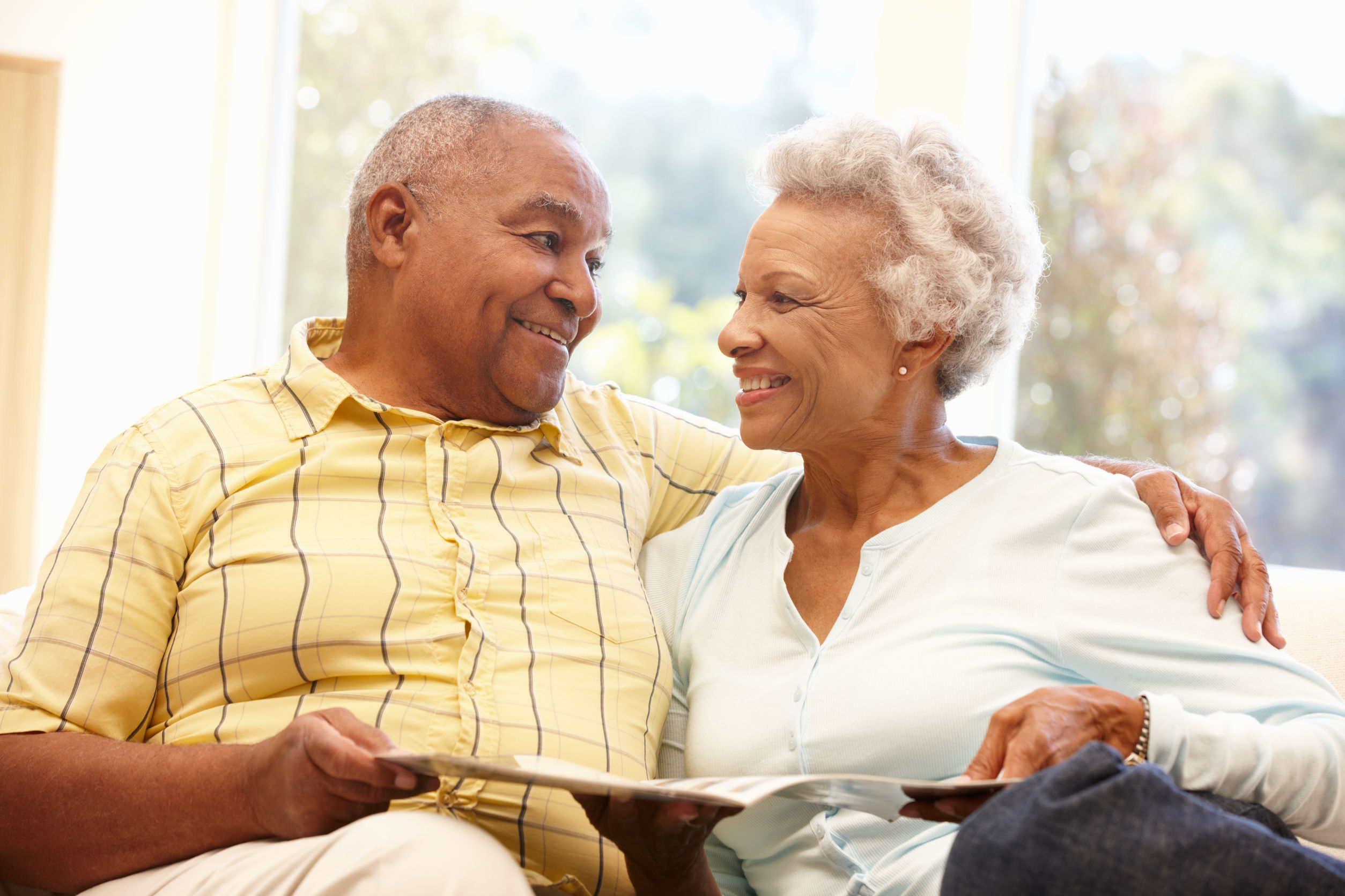 Senior African American couple reading